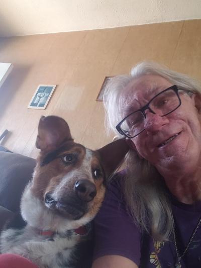 Selfie of Basil the dog with Dean in their home